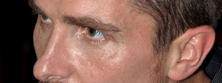 A cropped photo of Christian Bale's eyes at the premiere of the The Dark Knight in Barcelona